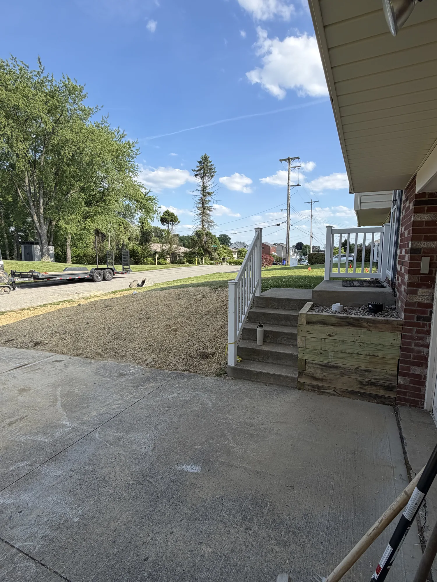 New concrete driveway and poured steps at a North Hills Pittsburgh home