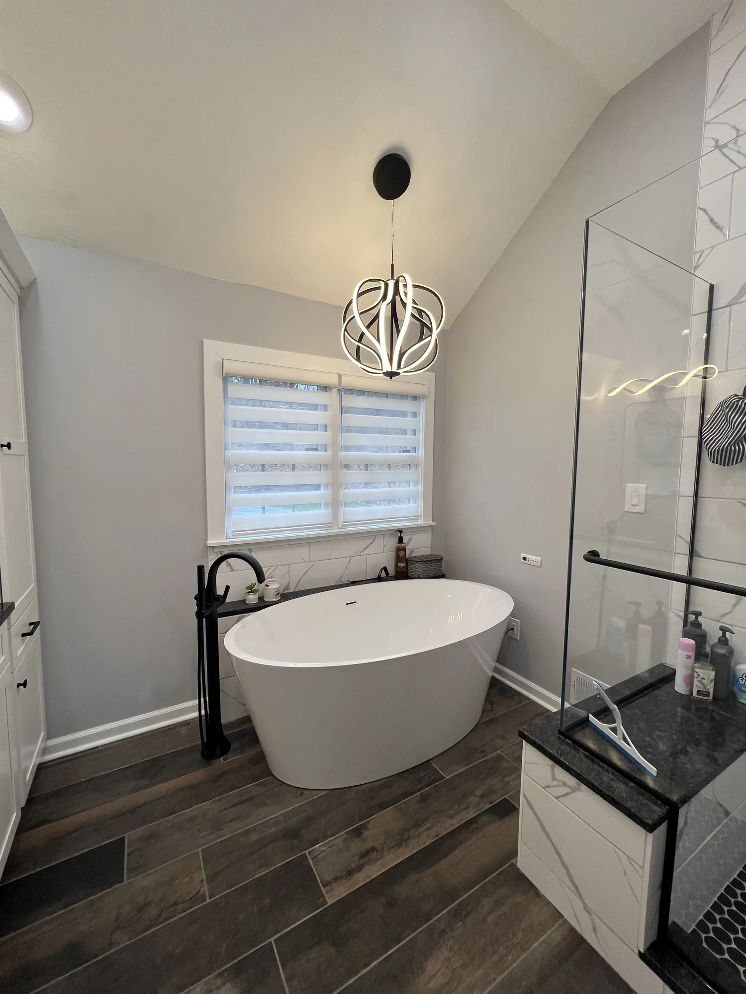 Freestanding tub and glass shower in a completed bathroom remodel in the North Hills of Pittsburgh